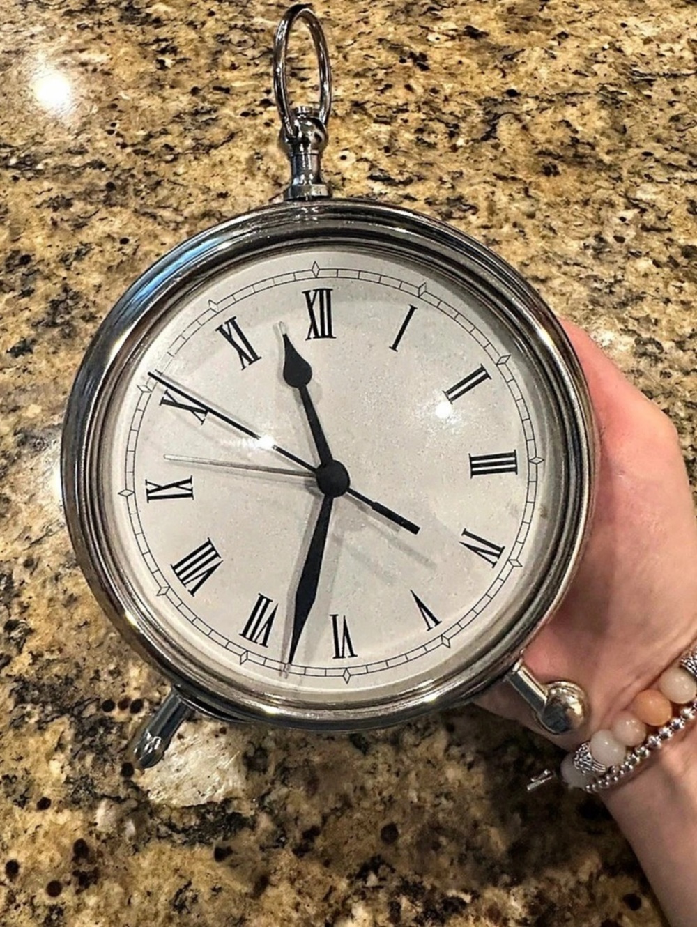 silver-finish pocket watch desk clock from Pottery Barn 5’